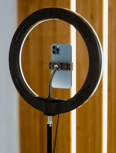 Ring light with iPhone as an external light source for product photography