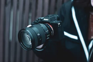 A Sony camera with a lens attached