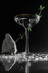 A wine glass on black background