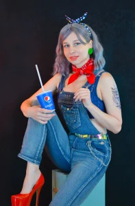 a photograph of a model is holding a soft drink product