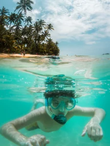 A half-underwater photo of snorkeling