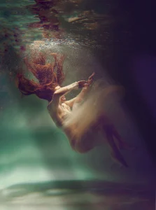Close-up Portrait photo of Woman Underwater