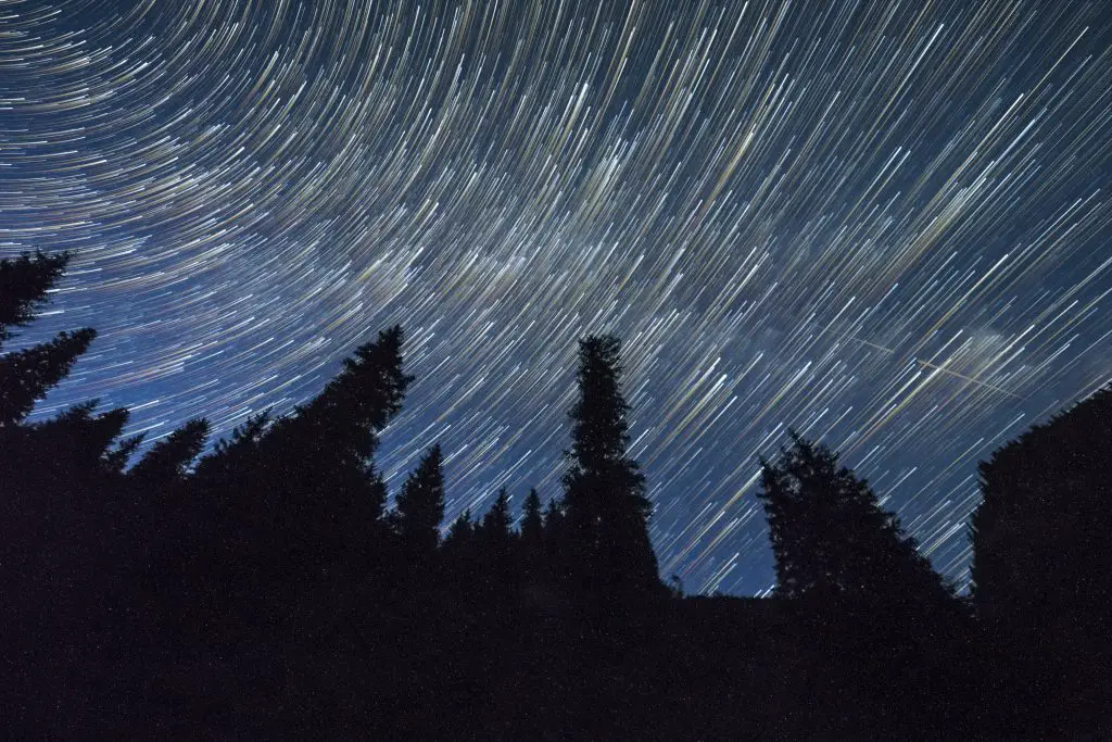 A photograph of a star trail at night