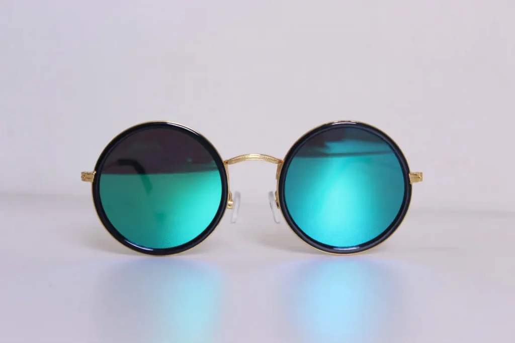 Minimalist fashion item photo of a black framed hippie sunglasses