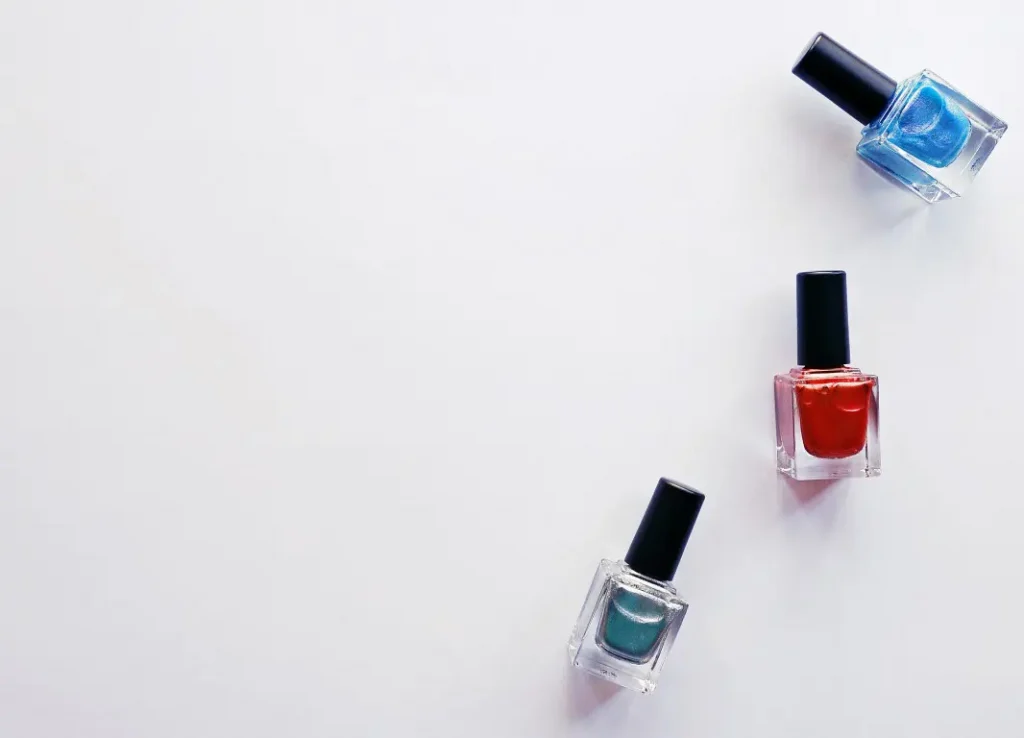 Nail polish on white background in a minimalist style