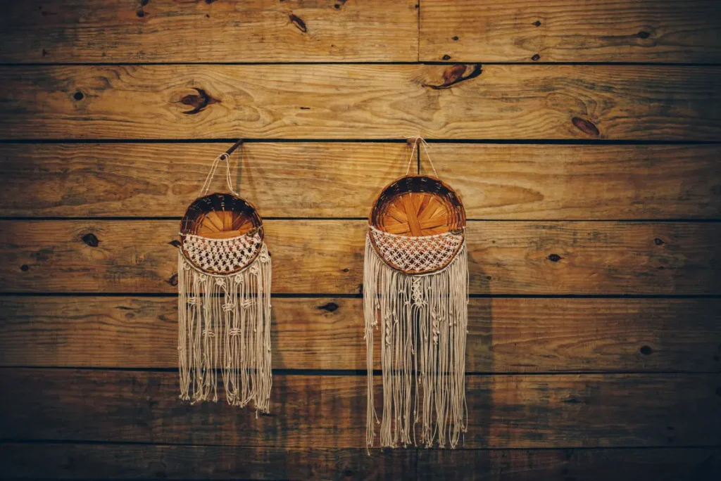 Rustic-style photography of handmade macrame on a wooden wall