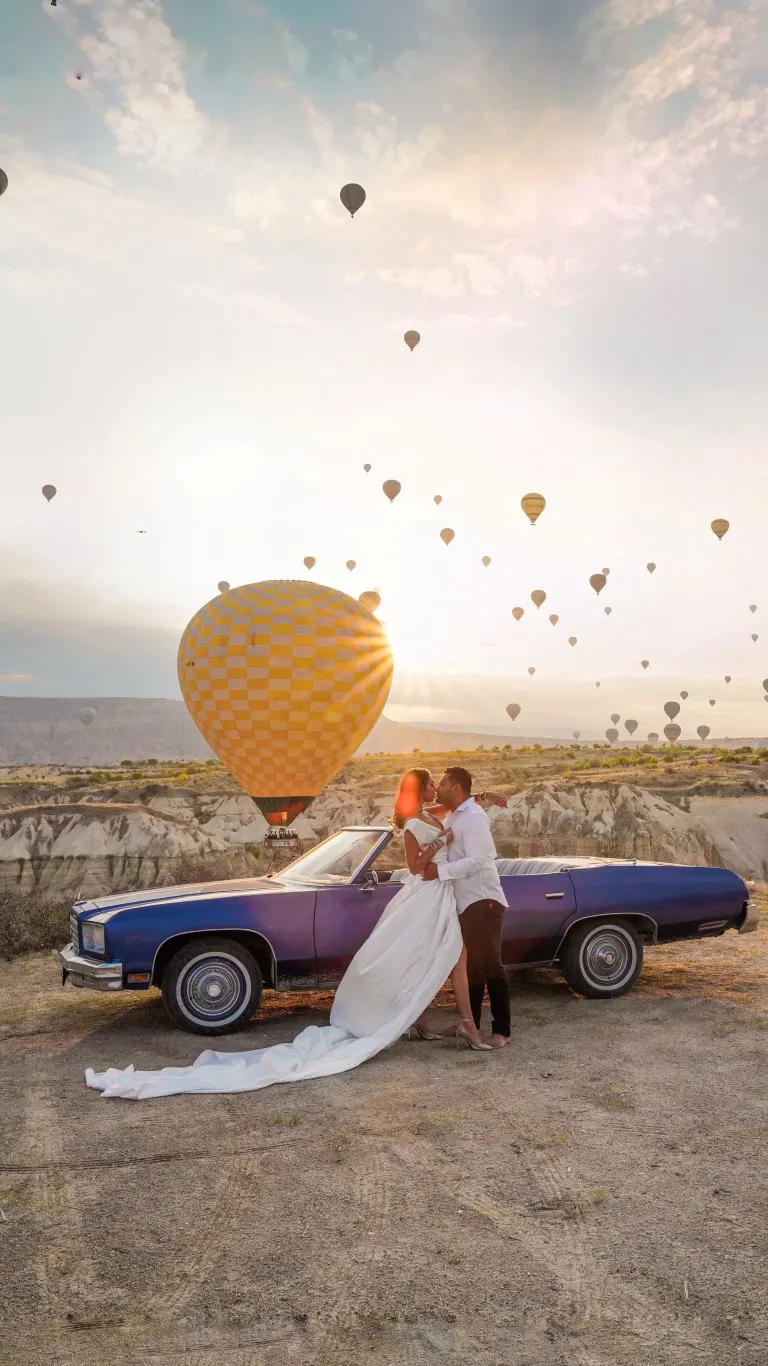 Elopement photography with hot air balloons background