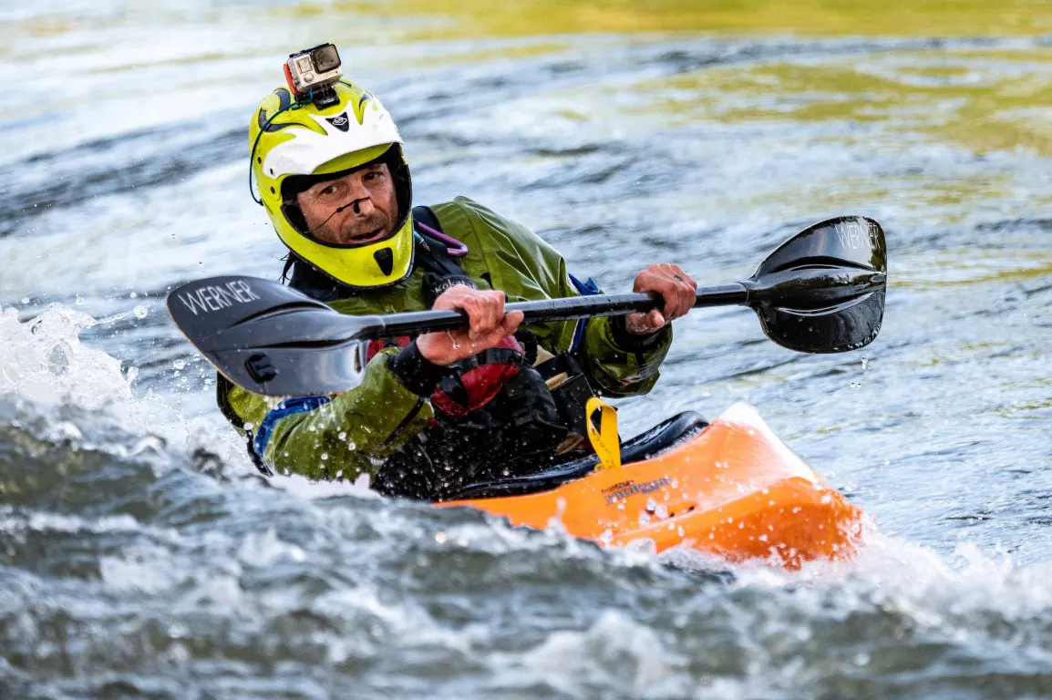 Camera is mounted on a kayakers helmet