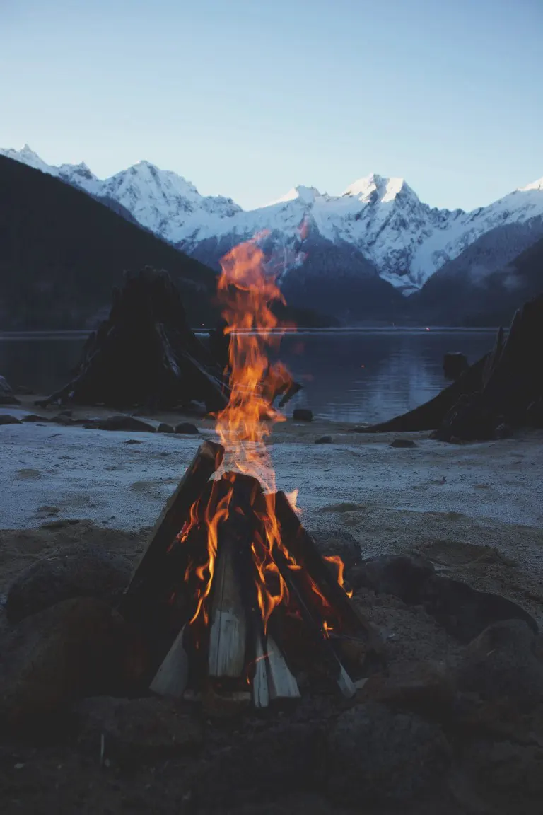 Bonfire with flames on landscape surroundings